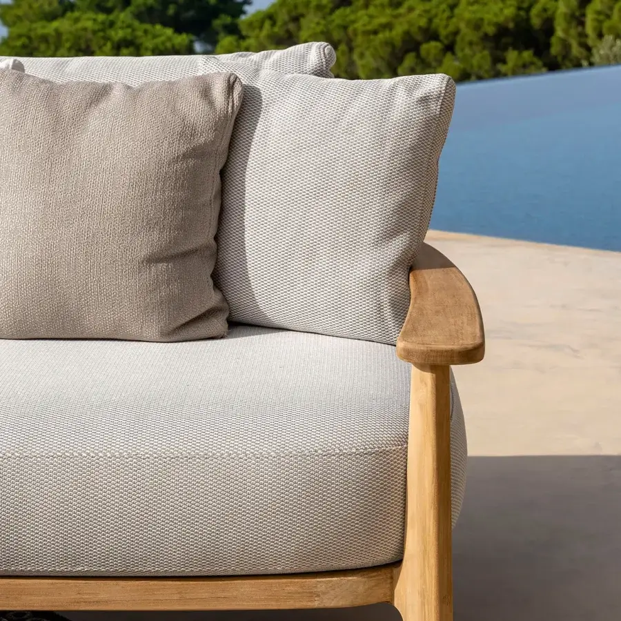 Elegant Talenti Ever sofa with woven textile in a neutral palette and light-toned wooden frame