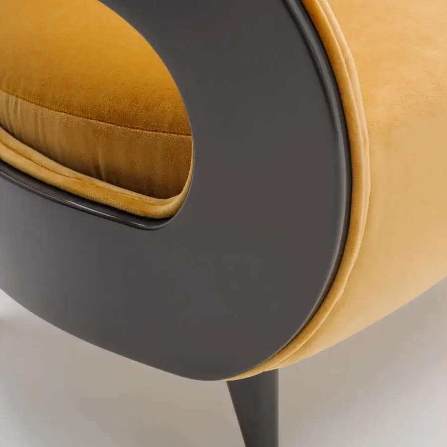 Superior Turri Miller lounge chair upholstered in striking mustard yellow textile with a glossy synthetic frame crafted in Italy
