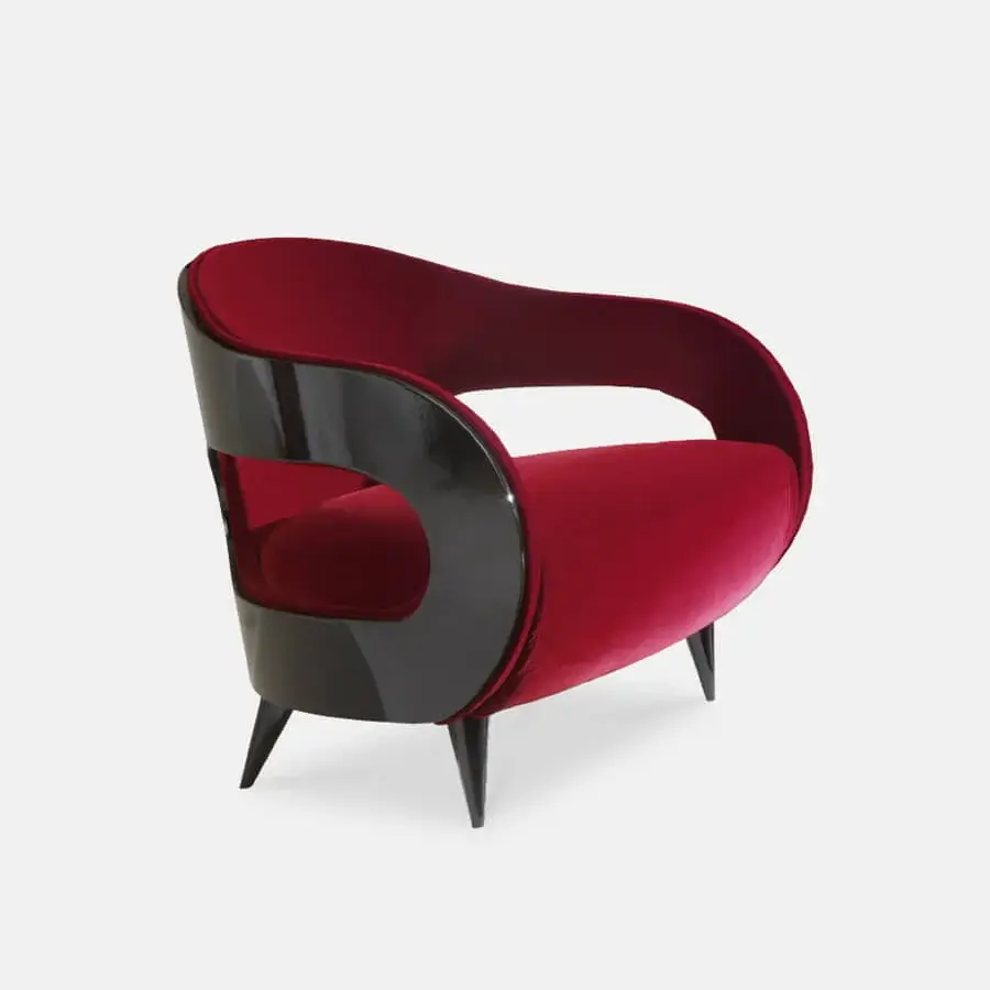 Distinguished Turri Miller lounge chair with vibrant red velvet-like textile and glossy dark-toned wooden frame crafted in Italy