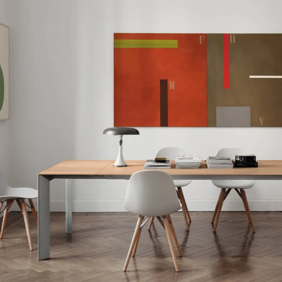Distinguished Bontempi Genio extendable table with a light brown wooden top and sleek matte gray metal frame