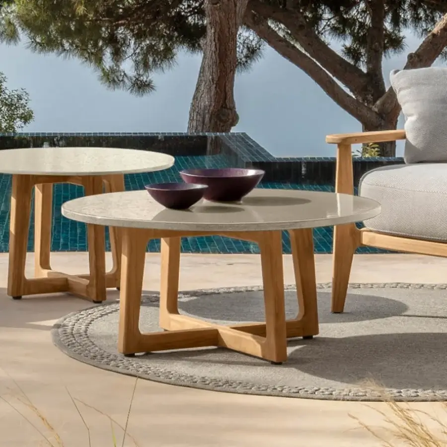 Distinguished Talenti Ever coffee table with speckled grey round tabletop and light brown wooden frame showcasing a contemporary design