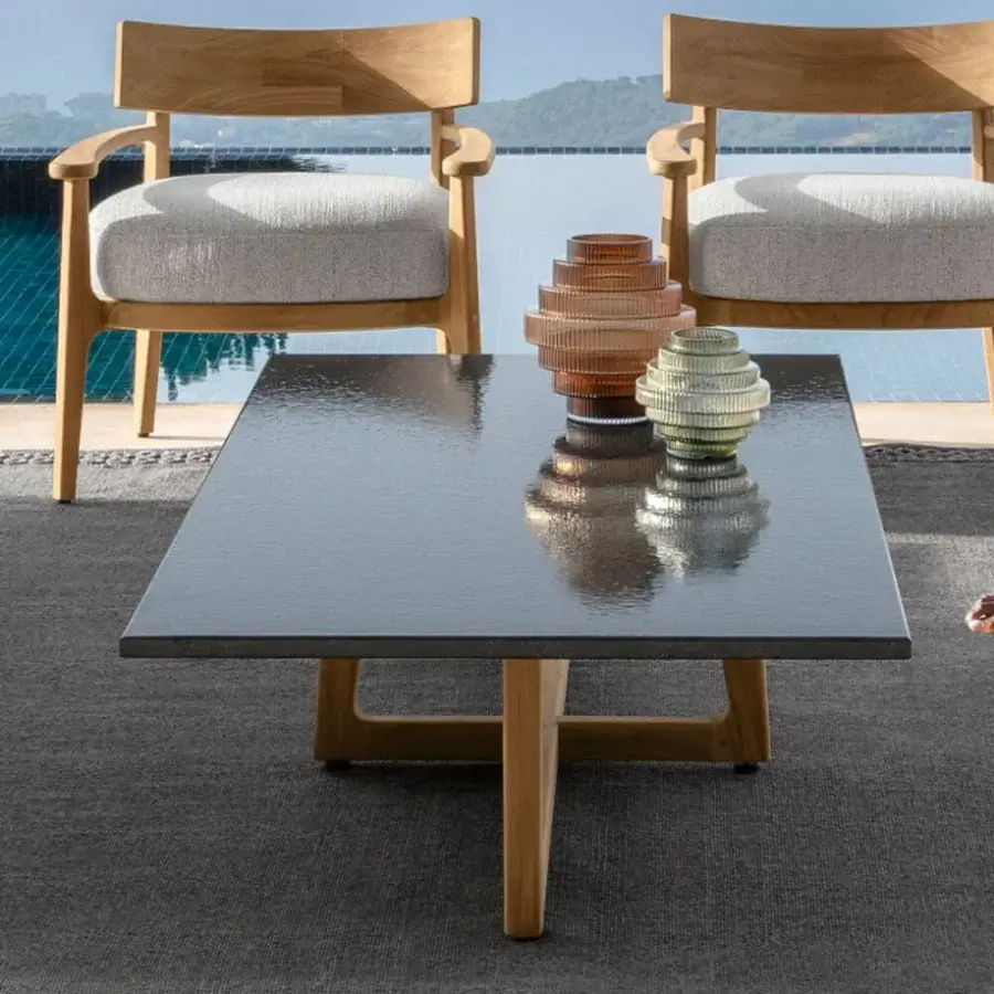 Distinguished Talenti Ever coffee table with a dark glossy top and light natural-toned wooden base showcasing a modern low profile design