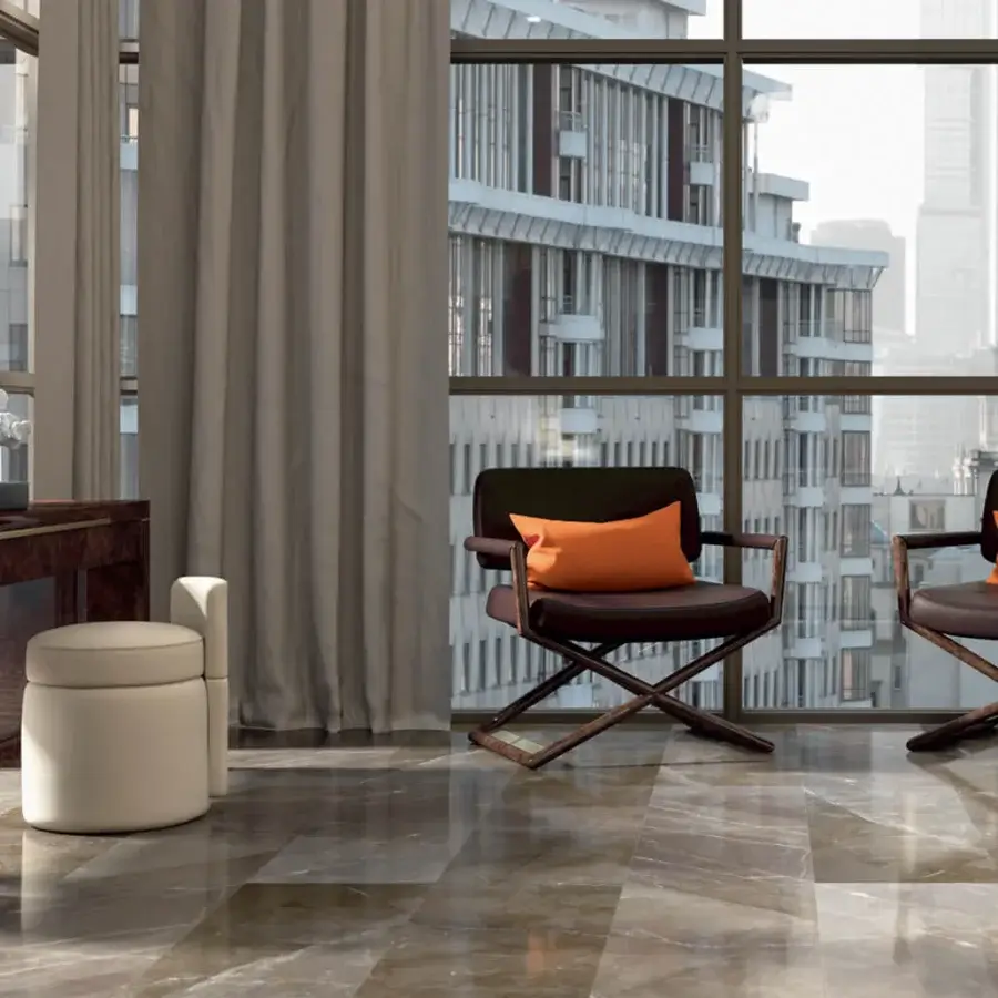 Exceptional Turri Madison ottoman with cylindrical form upholstered in light beige fabric and matte finish
