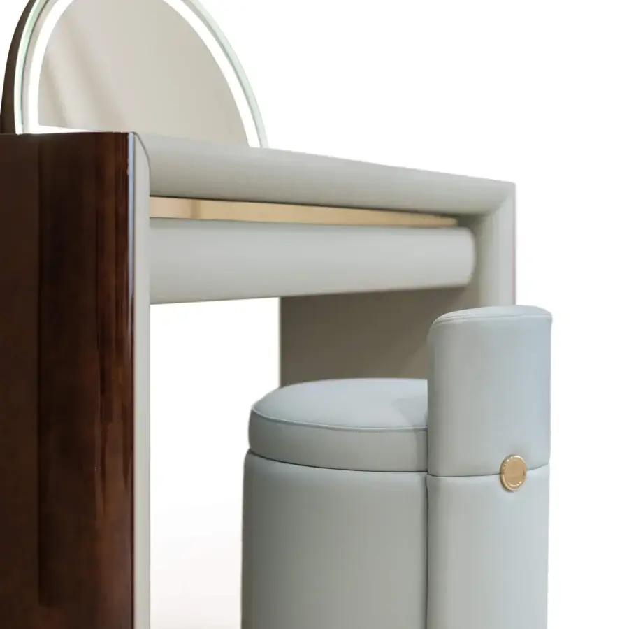 Exclusive Turri Madison ottoman crafted in Italy with light gray textile upholstery and gold button detail