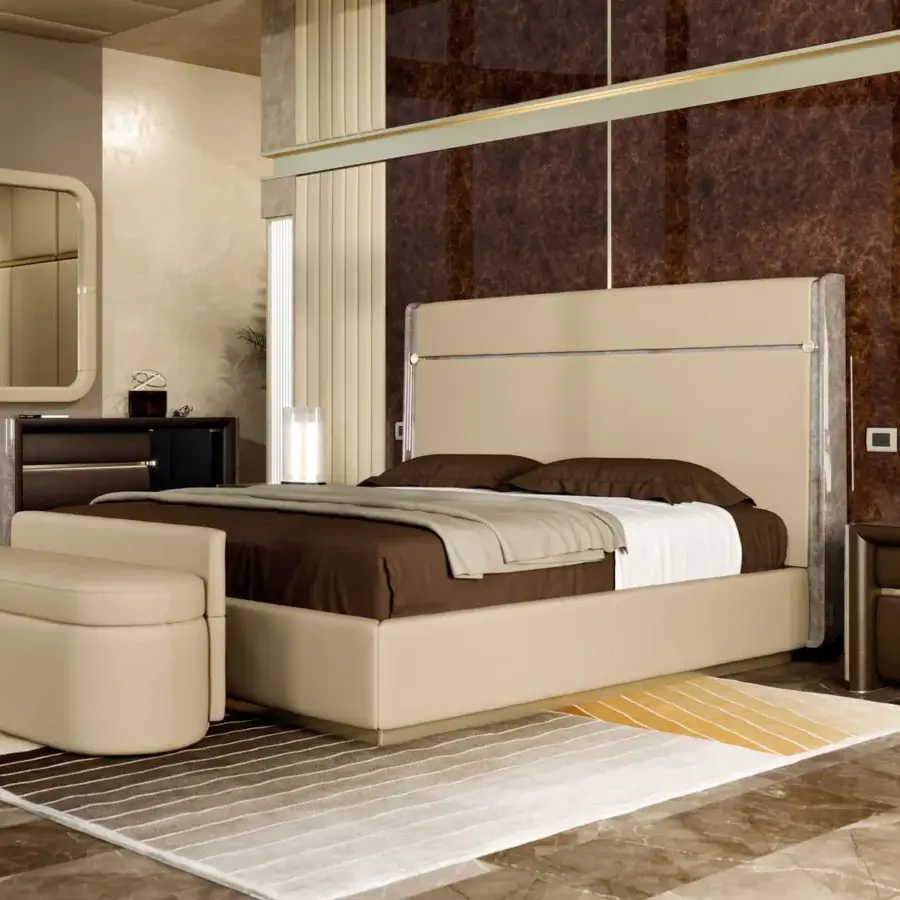 Distinguished Turri Madison bench fully covered in light beige leather with a refined gold button adorning the back