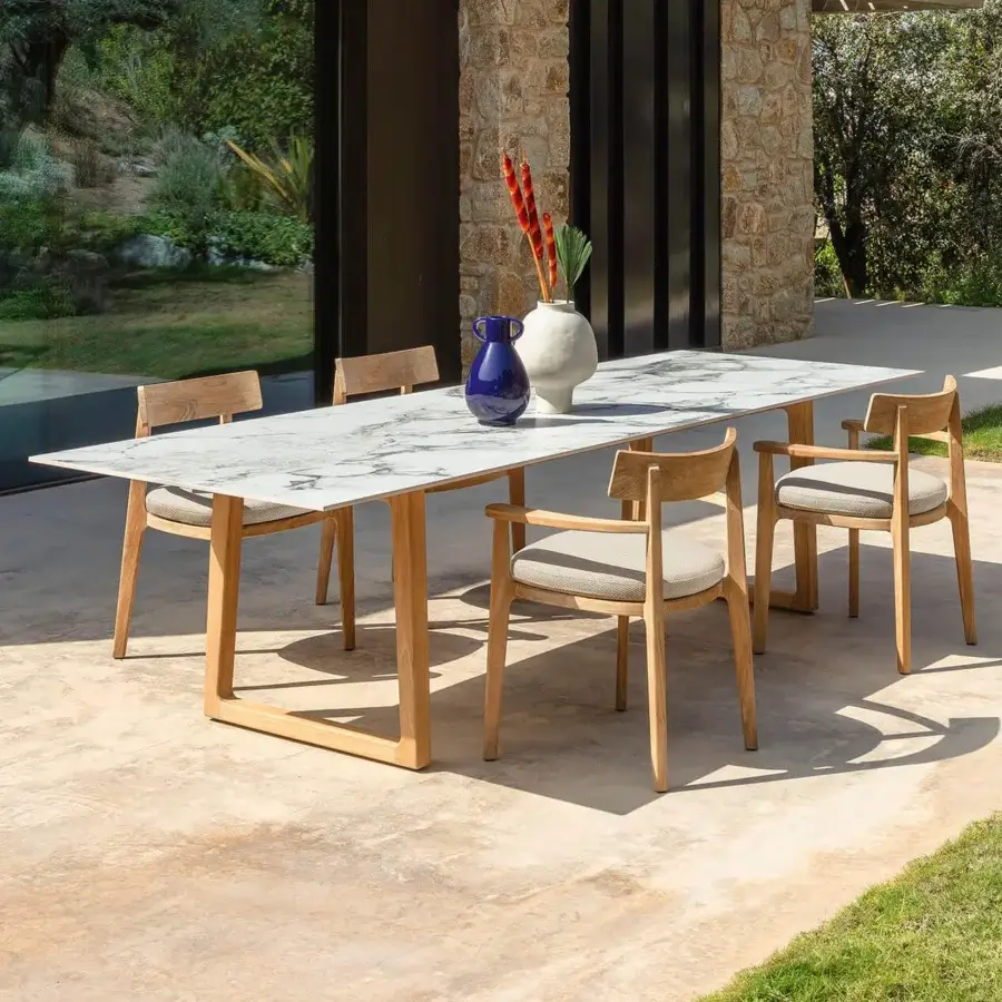 Elegant Talenti Ever table with light-colored top and sleek wood frame built with a matte finish