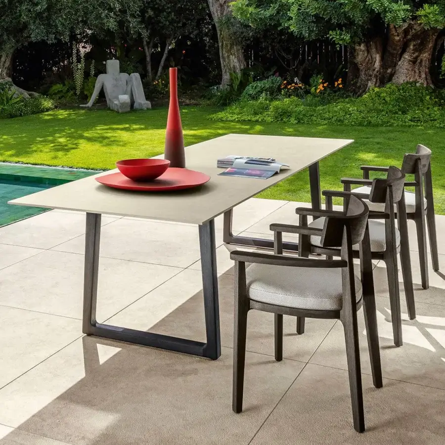 Exceptional Talenti Ever table with light-toned surface and dark frame in a smooth matte finish