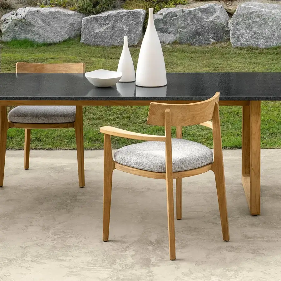 Elegant Talenti Ever armchair with a solid wooden structure upholstered in light gray textile and smooth finish