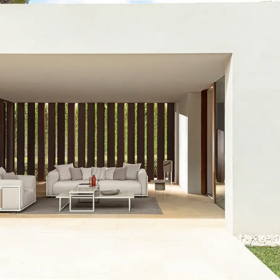 Distinguished Talenti Tressé sofa with light gray eco-leather bands woven around a tubular aluminum structure and matching cushions