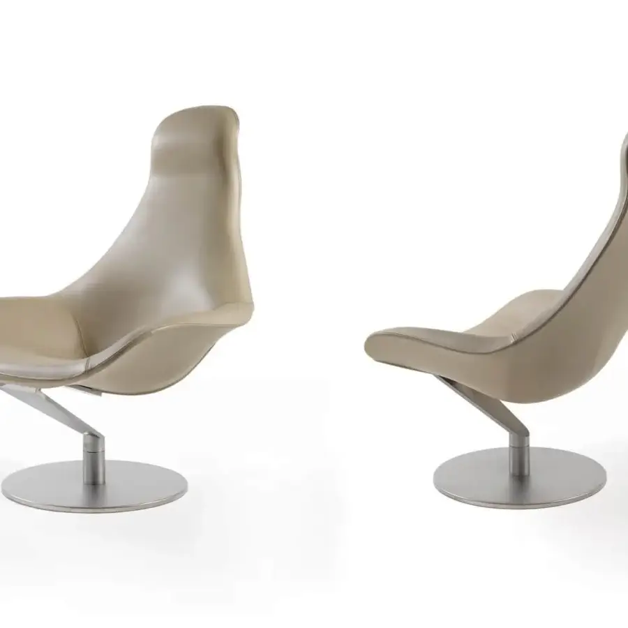 Superior Reflex Zenith lounge chair upholstered in smooth light beige material with a glazed stainless steel swiveling base