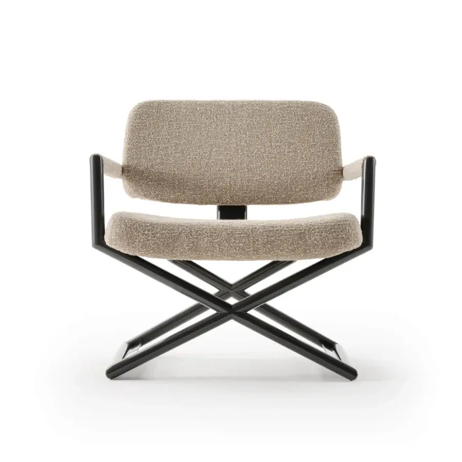 Distinguished Turri Madison lounge chair with light beige textile and a sleek black metal frame crafted in Italy