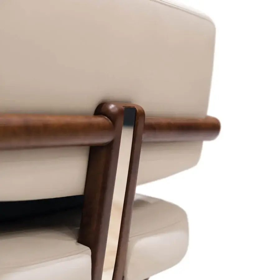 Superior Turri Madison director lounge chair with a glossy medium-brown wooden frame and light beige fabric or leather upholstery