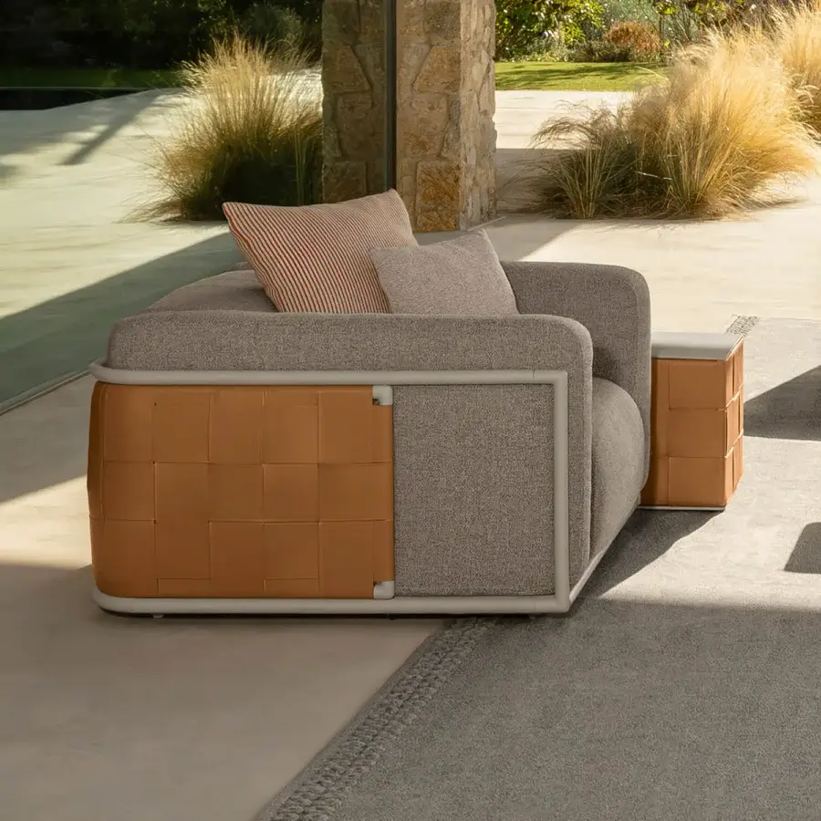 Exceptional Talenti Tressé lounge chair with woven eco-leather detailing and coarse grey upholstery built on a light aluminum frame