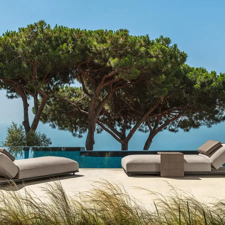 Captivating Talenti Tressé lounger with light gray hemp fabric and dark metal base for relaxing poolside use
