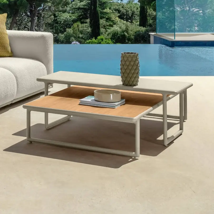 Distinguished Talenti Tressé coffee table crafted with light gray powder-coated aluminum and glazed lava stone with a wood-look tier