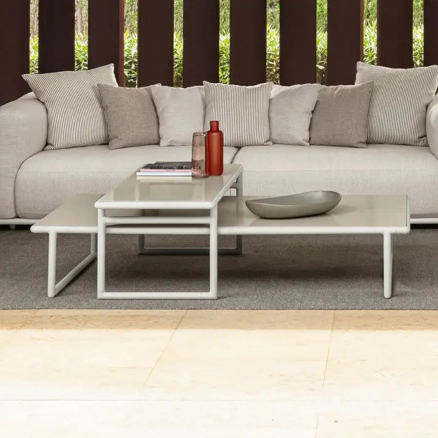 Distinguished Talenti Tressé coffee table with glazed lava stone top and light gray tubular aluminum structure in matte finish