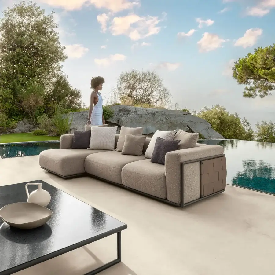 Sophisticated Talenti Tressé coffee table with dark glazed lava stone and matte tubular aluminum frame