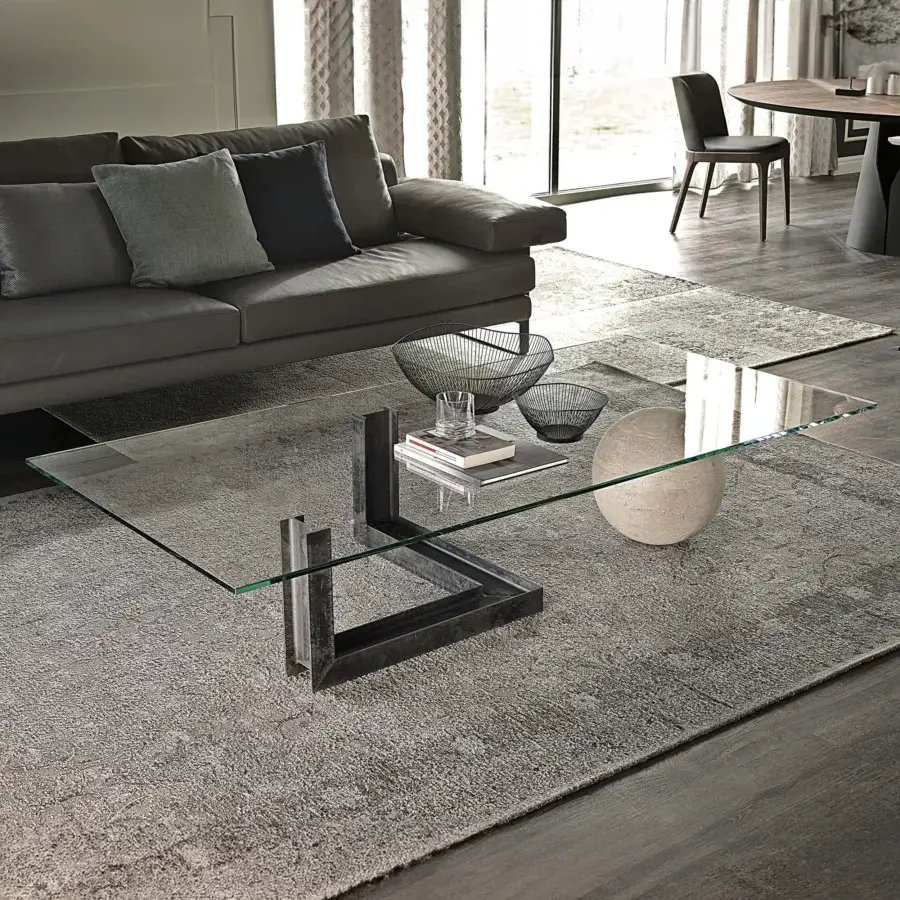 Superior Cattelan Italia Levante coffee table with a transparent glass top and rough steel beam built with natural travertine