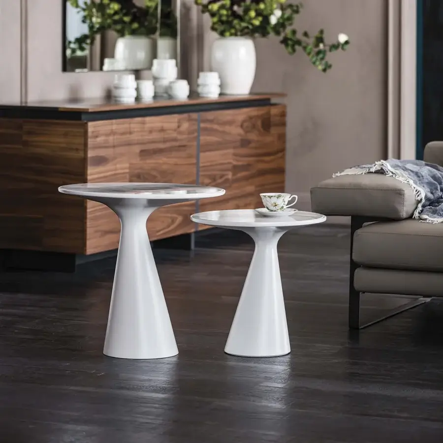 Distinguished Cattelan Italia Peyote Keramik side table with a curved silhouette and matte metallic finish in white Marmi ceramic