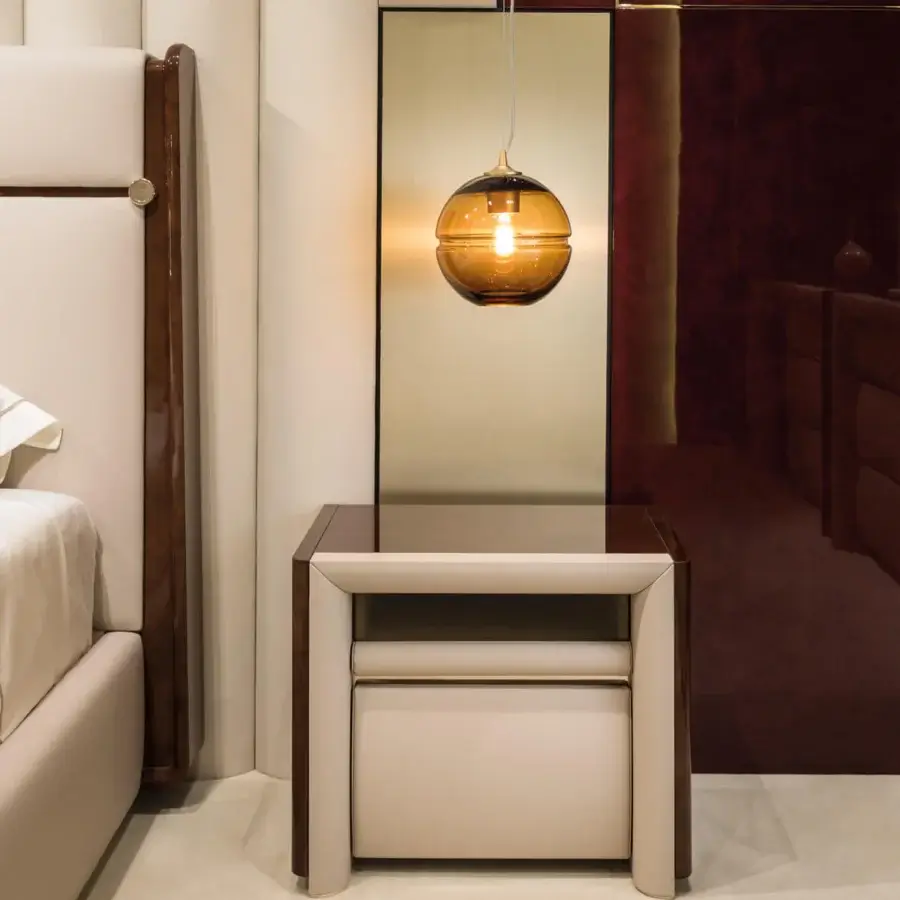 Distinguished Turri Madison nightstand with glossy lacquered wood and beige leather panels built on a curved plinth base