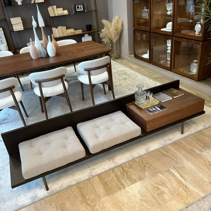 Distinguished Pacini & Cappellini plank bench crafted in solid Canaletto walnut with tufted light beige cushions and dark brown matte finish