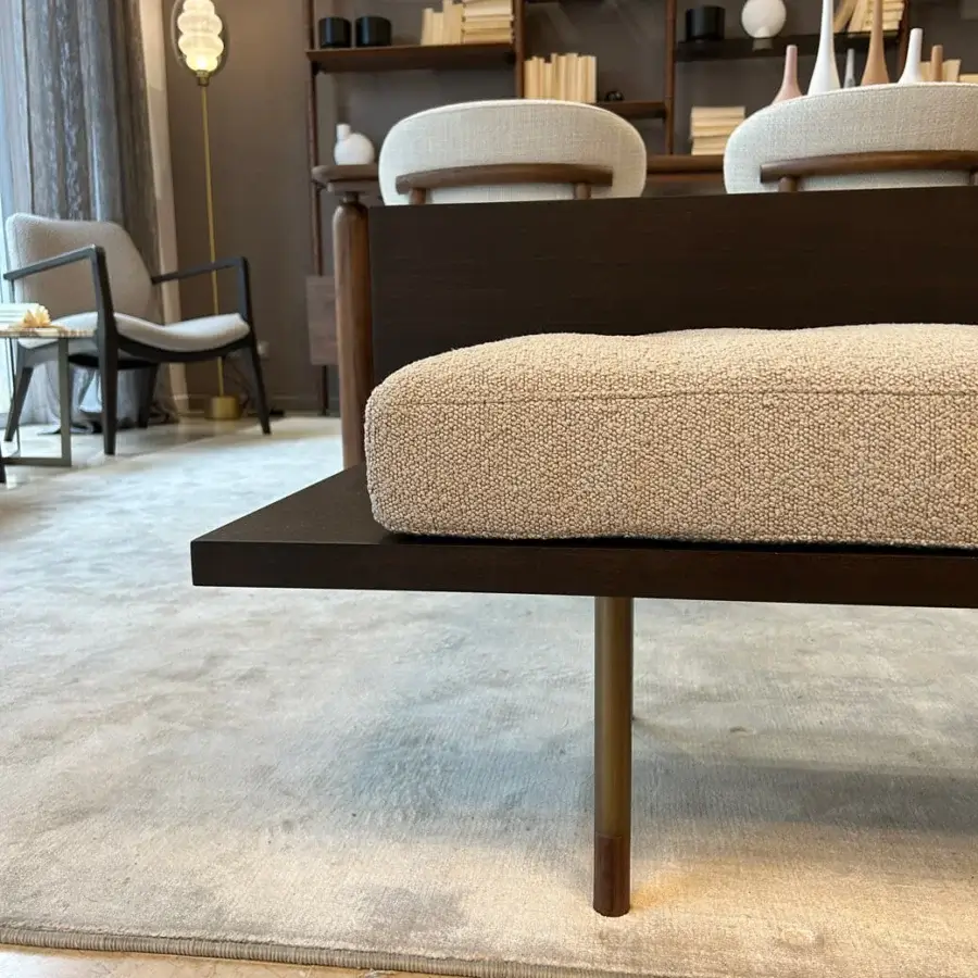 Distinguished Pacini & Cappellini plank bench crafted in solid Canaletto walnut with a light beige textured cushion