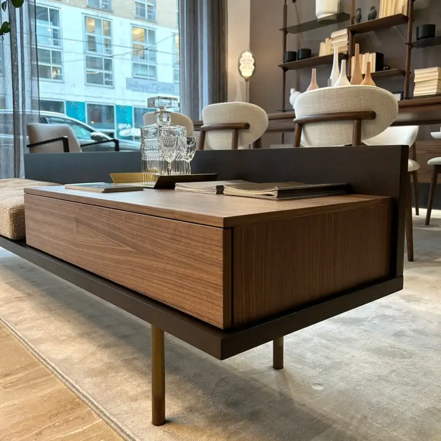 Distinguished Pacini & Cappellini plank bench crafted in solid Canaletto walnut with smooth medium-brown finish and unique cylindrical legs