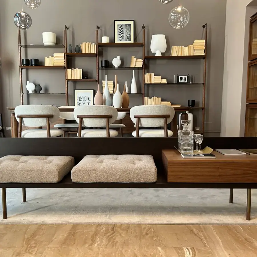Superior Pacini & Cappellini plank bench crafted in solid Canaletto walnut with light beige tufted cushions and bronzed metal legs