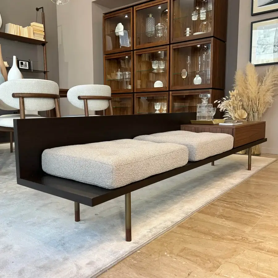 Exceptional Pacini & Cappellini plank bench in solid Canaletto walnut with light gray cushions and brass-like metal legs
