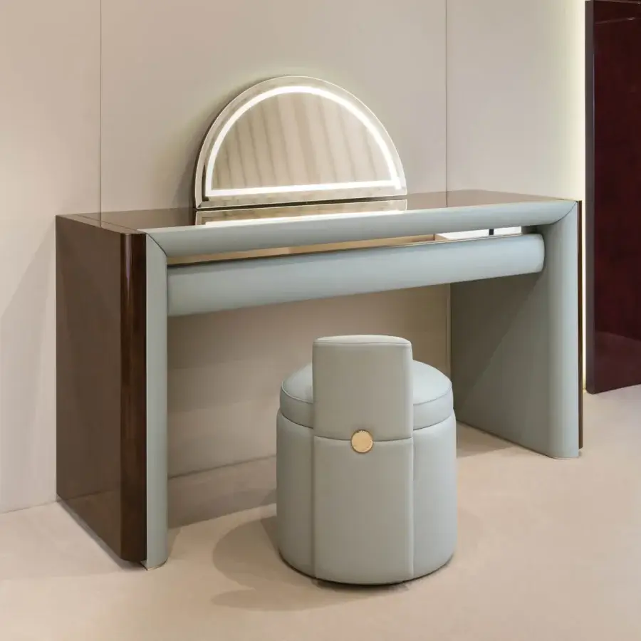 Distinguished Turri Madison vanity with light blue-grey leather interiors and gold metal details in a dark wood-like shell finish