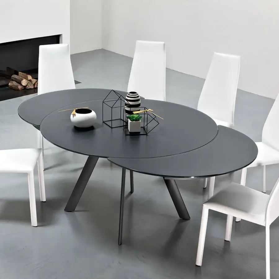 Exceptional Bontempi Giro table with dark gray tabletop and metal legs in a matte finish crafted with a synchronized opening mechanism