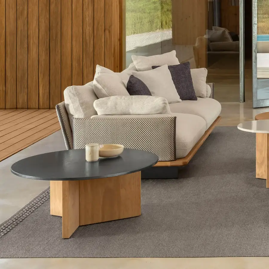 Distinguished Talenti Venice Sofa, a sofa with light beige textile and natural wood base exhibiting contemporary nautical design