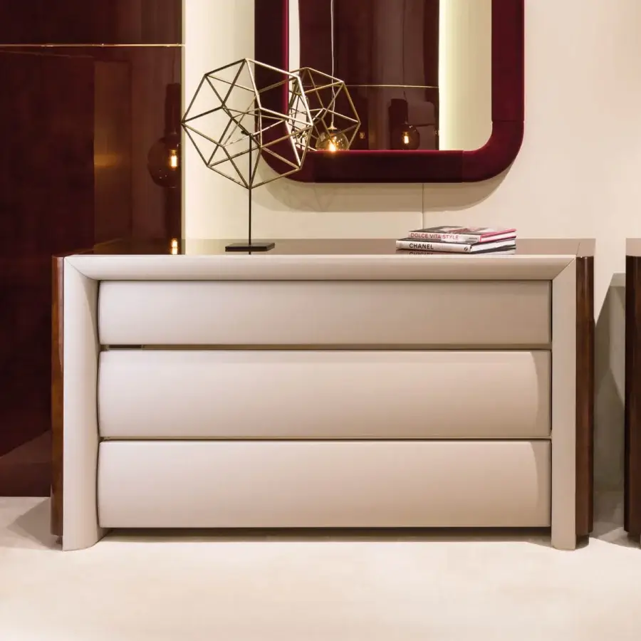 Superior Turri Madison dresser with glossy lacquered wood and light beige upholstered drawers exhibiting contemporary design