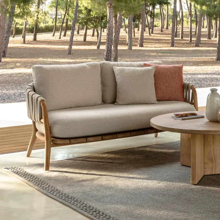 Distinguished Talenti Venice love seat sofa with solid wood frame and comfortable light beige cushions defined by soft lines and rope detailing