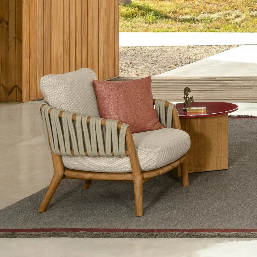 Distinguished Talenti Venice lounge chair crafted with teak wood and enveloping neutral fabrics, boasting a braided rope back detail