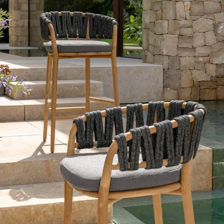 Distinguished Talenti Venice bar stool with solid teak wood structure and gray woven comfortable seat