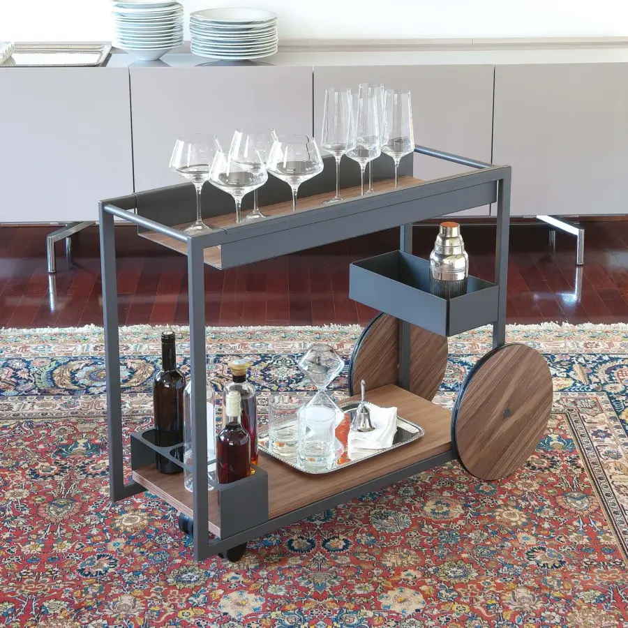 Elegant Cattelan Italia Brandy trolley with geometric dark grey steel frame and smooth medium-toned wooden shelves built with bottle compartment