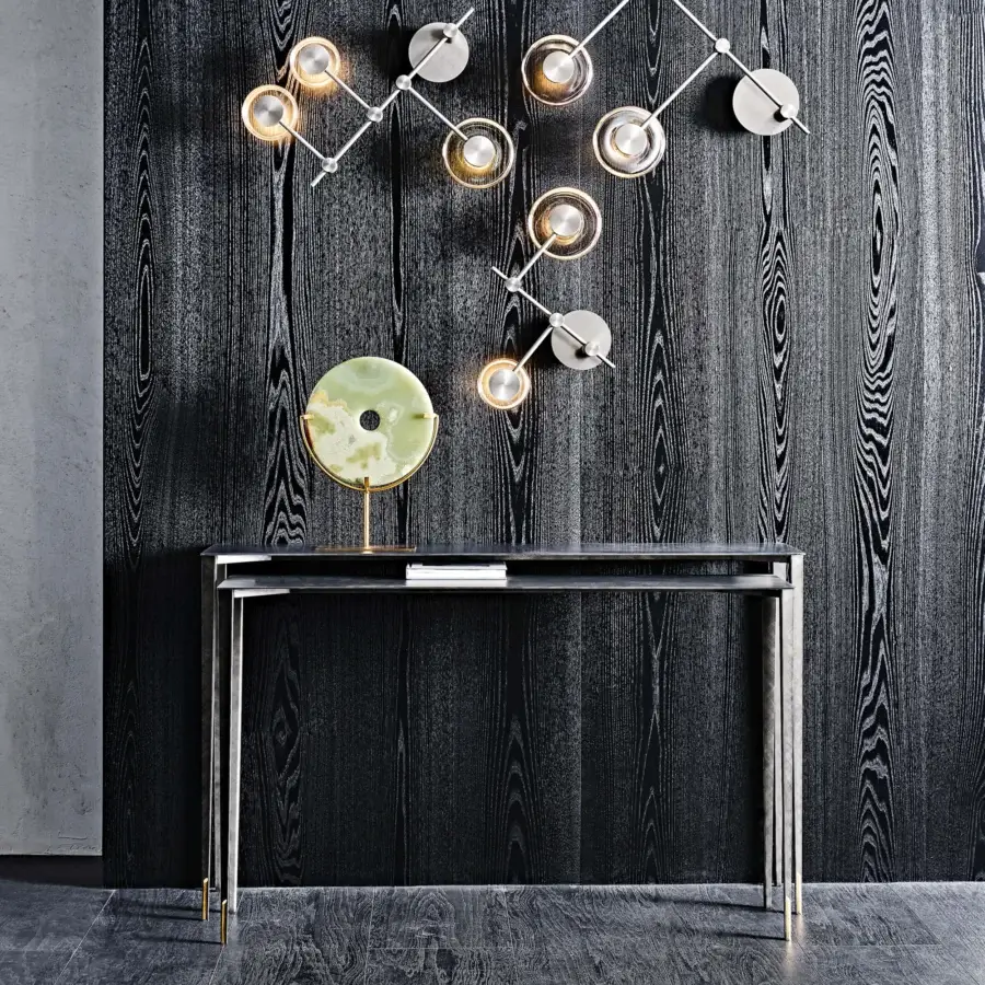 Elegant Cattelan Italia Etoile console with geometric silhouette in dark tones and satin-finished metal legs