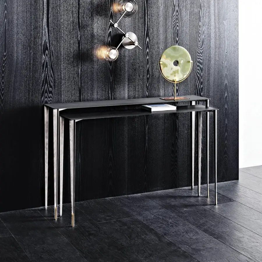 Exceptional Cattelan Italia Etoile console with slender metallic legs and dark rectangular shelves crafted in brass details