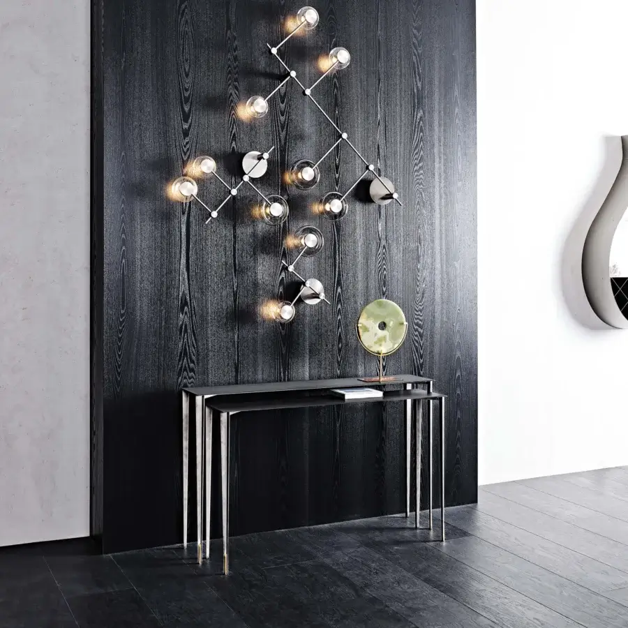 Distinguished Cattelan Italia Etoile console with slender metal legs and a contrasting matte tabletop exhibiting exquisite brass details and glossy frame