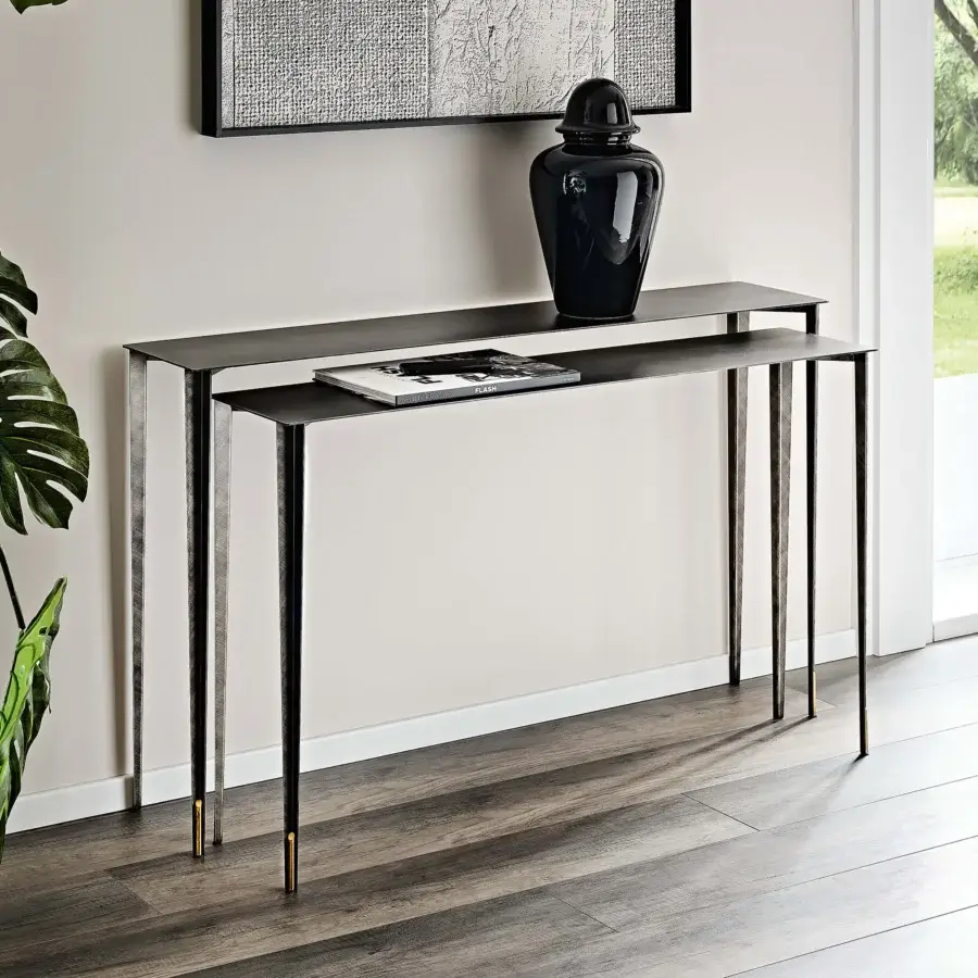Captivating Cattelan Italia Etoile console with slender metal legs, two tiers and a dark textured finish with brass accents