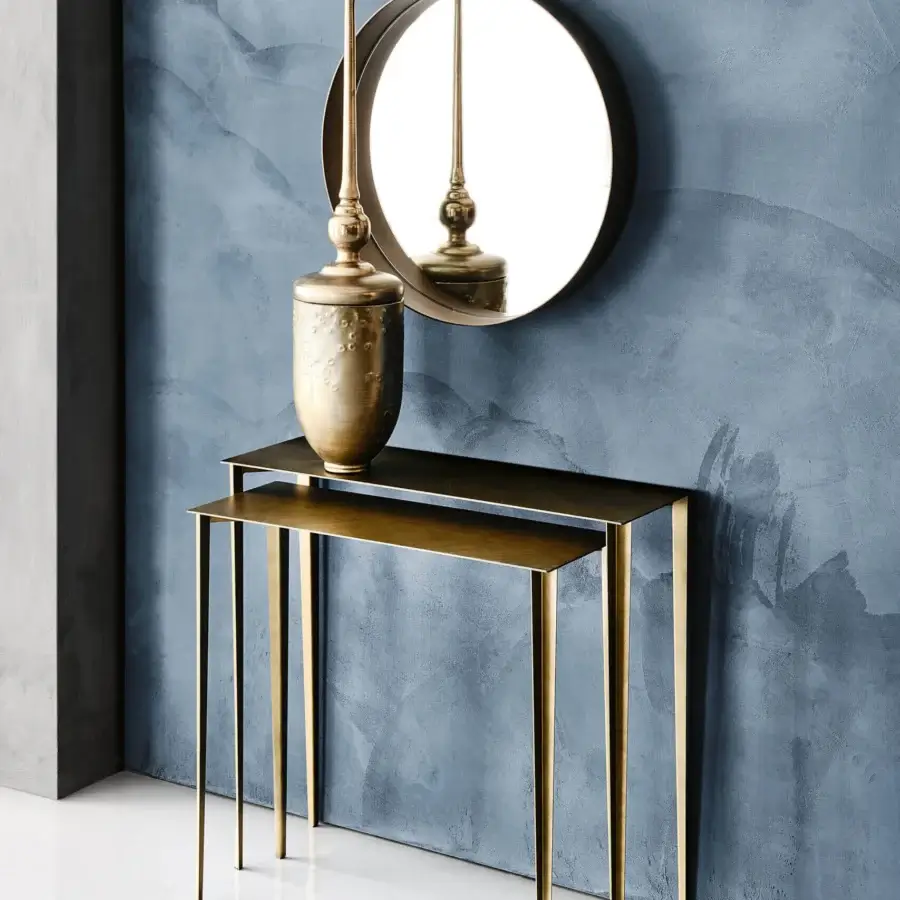 Lavish Cattelan Italia Etoile console with intersecting legs and two-tiered brass structure crafted in a warm reflective finish