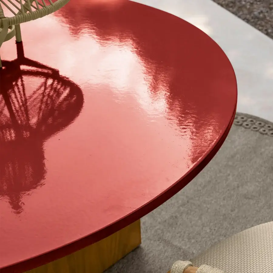 Exceptional Talenti Venice table with glossy ceramic lava stone top and rectangular wooden base creating a vibrant red hue