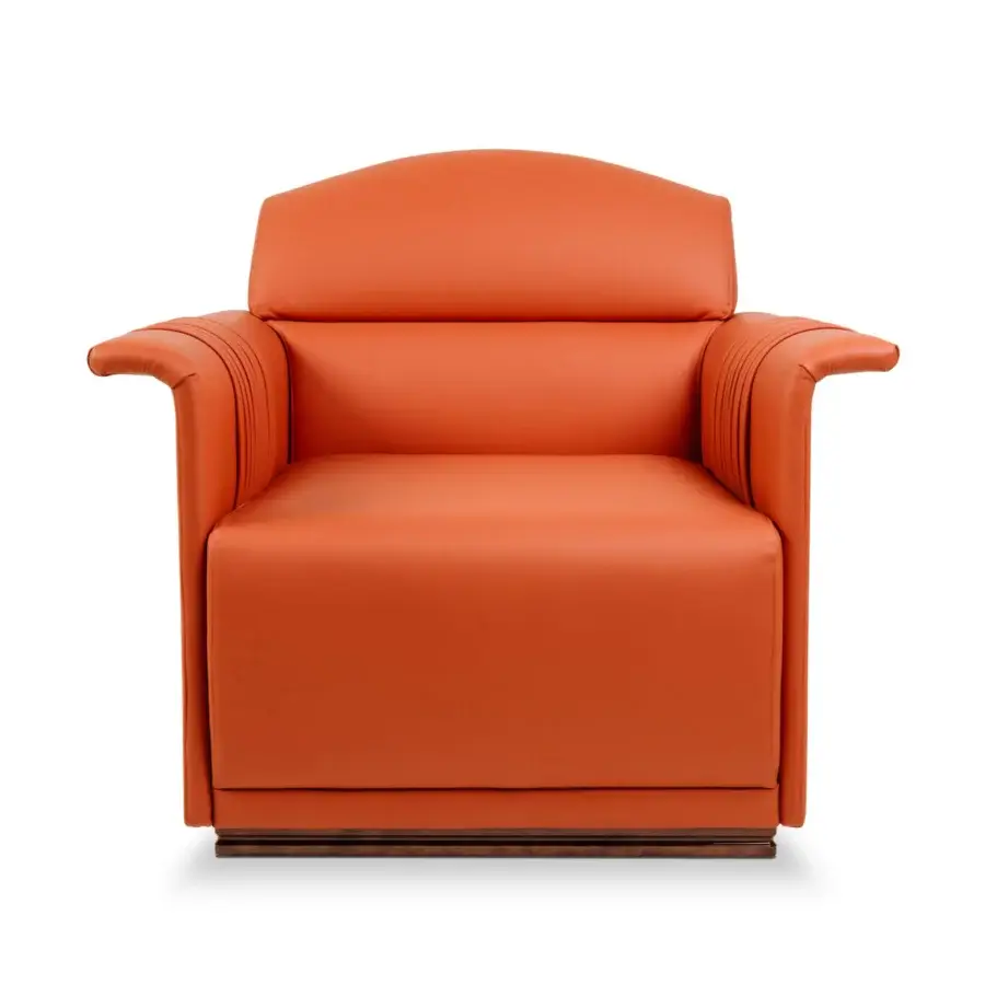 Distinguished Turri Madison lounge chair upholstered in smooth saturated orange leather with dark-toned wooden base