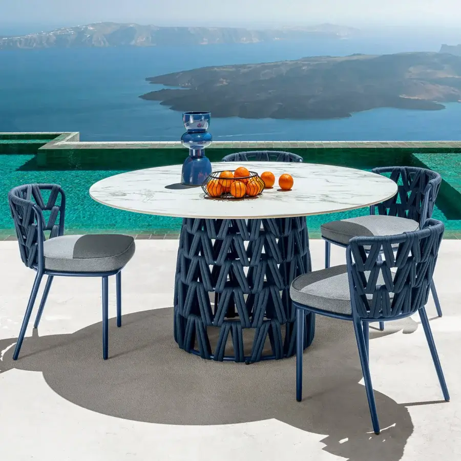 Distinguished Talenti Swipe chair with a dynamic navy blue aluminum structure and soft gray textile seat