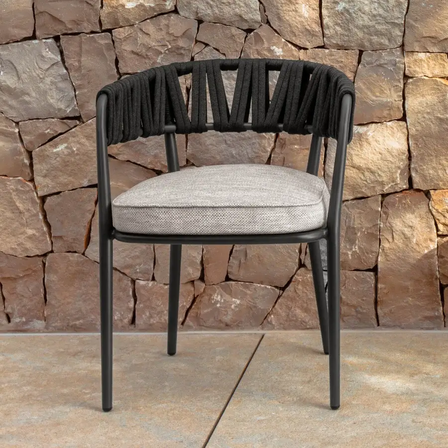 Sophisticated Talenti Swipe armchair with a lightweight aluminum frame and light grey textile seat cushion crafted with woven black ropes