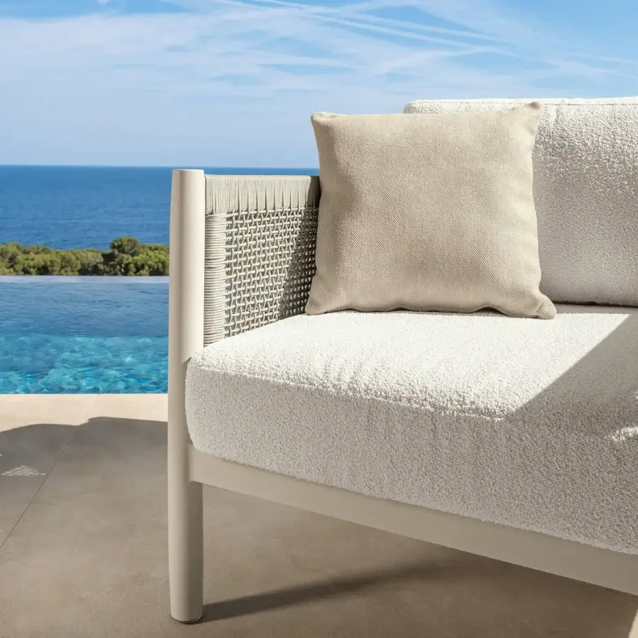 Distinguished Talenti Dolcevita Alu sofa with aluminum frame and light beige textile cushions presents a refined lateral weave