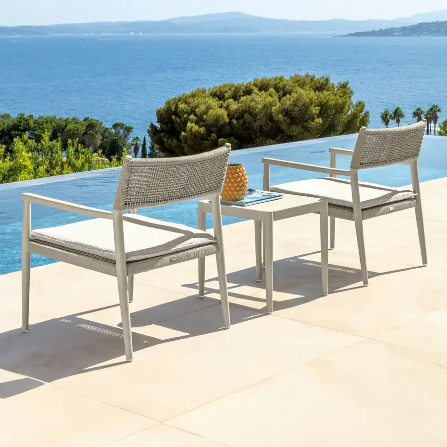 Distinguished Talenti Dolcevita Alu lounge chair with light-toned aluminum frame and woven textile backrest for inviting outdoor spaces