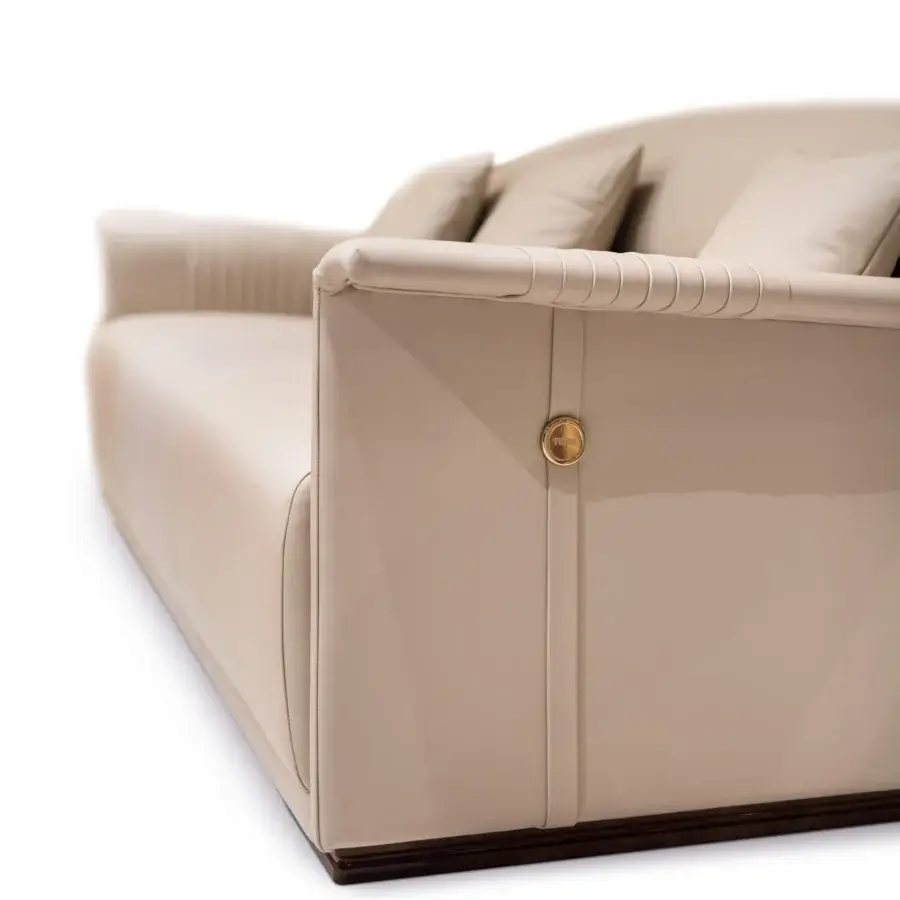 Exceptional Turri Madison sofa with light beige textile upholstery and dark-toned wooden base crafted with stylish embroidery