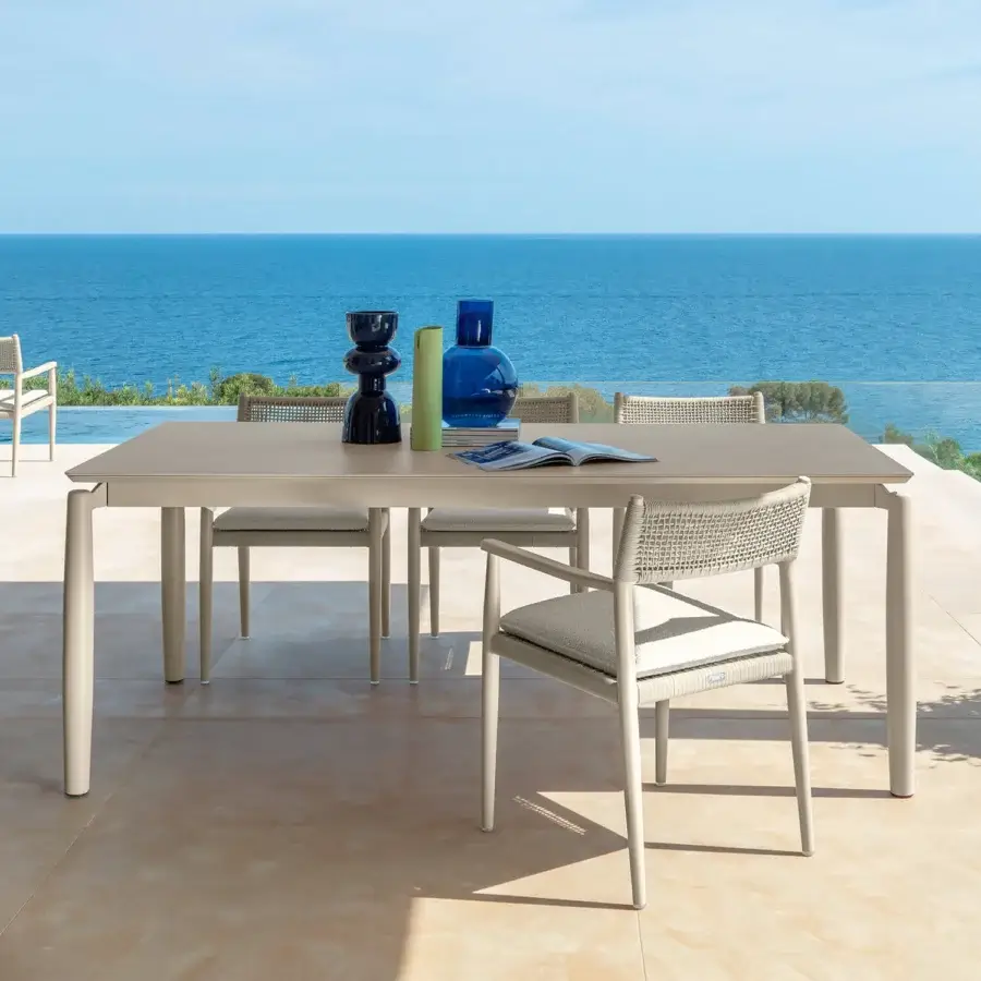 Sophisticated Talenti Dolcevita Alu armchair with lightweight aluminum frame and intricately woven backrest crafted in Italy